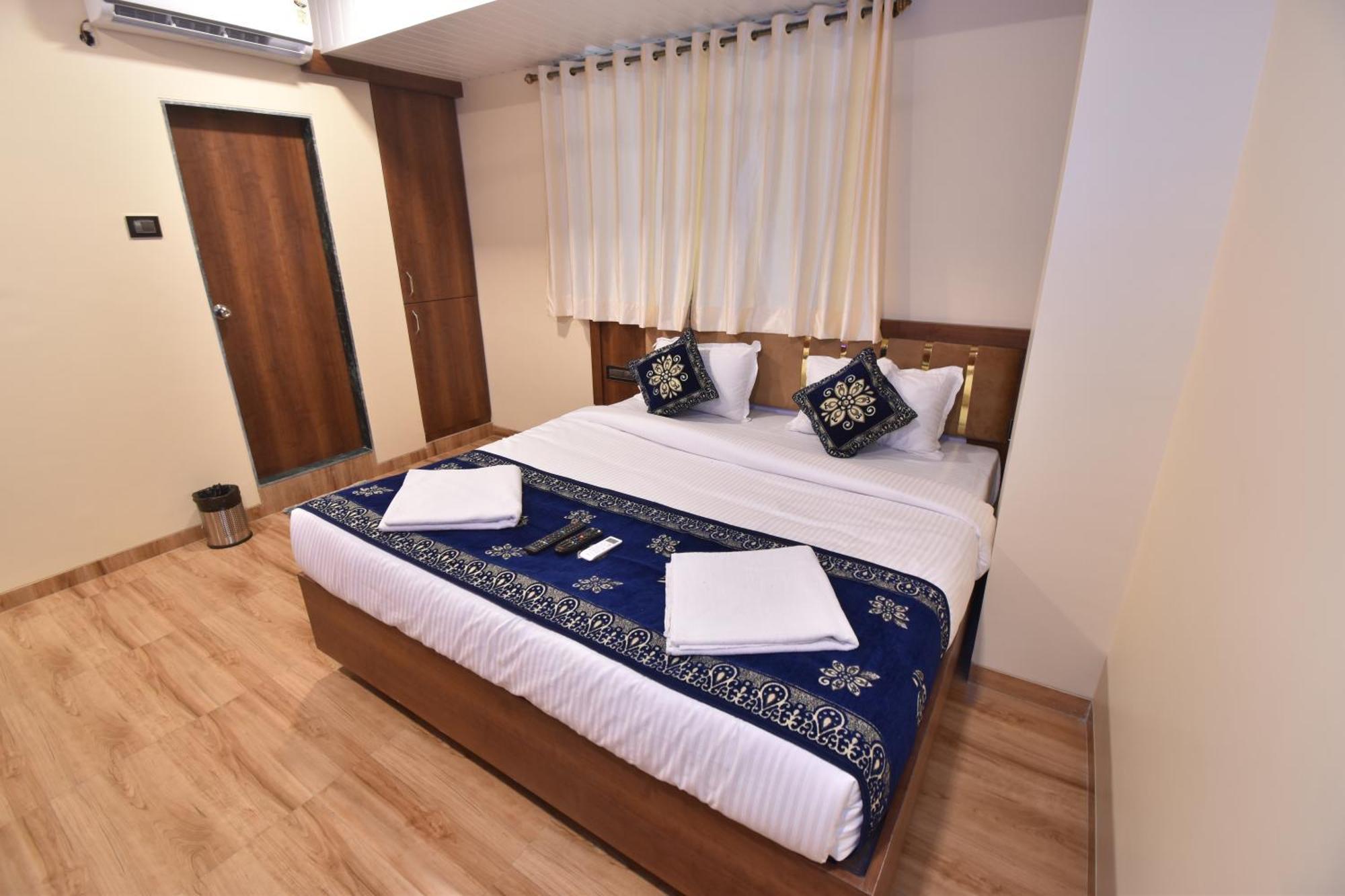نافي مومباي Hotel Starlit الغرفة الصورة